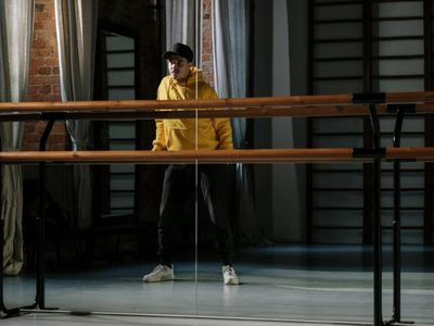 Person practicing focus exercises in a modern office